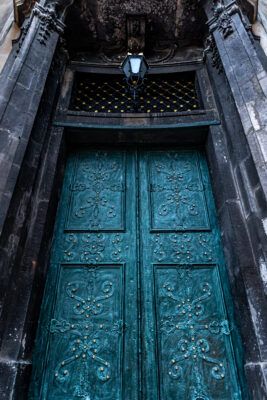 Ancient doors in the cathedral, turquoise old doors.