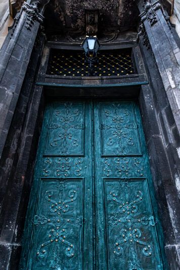Ancient doors in the cathedral, turquoise old doors.